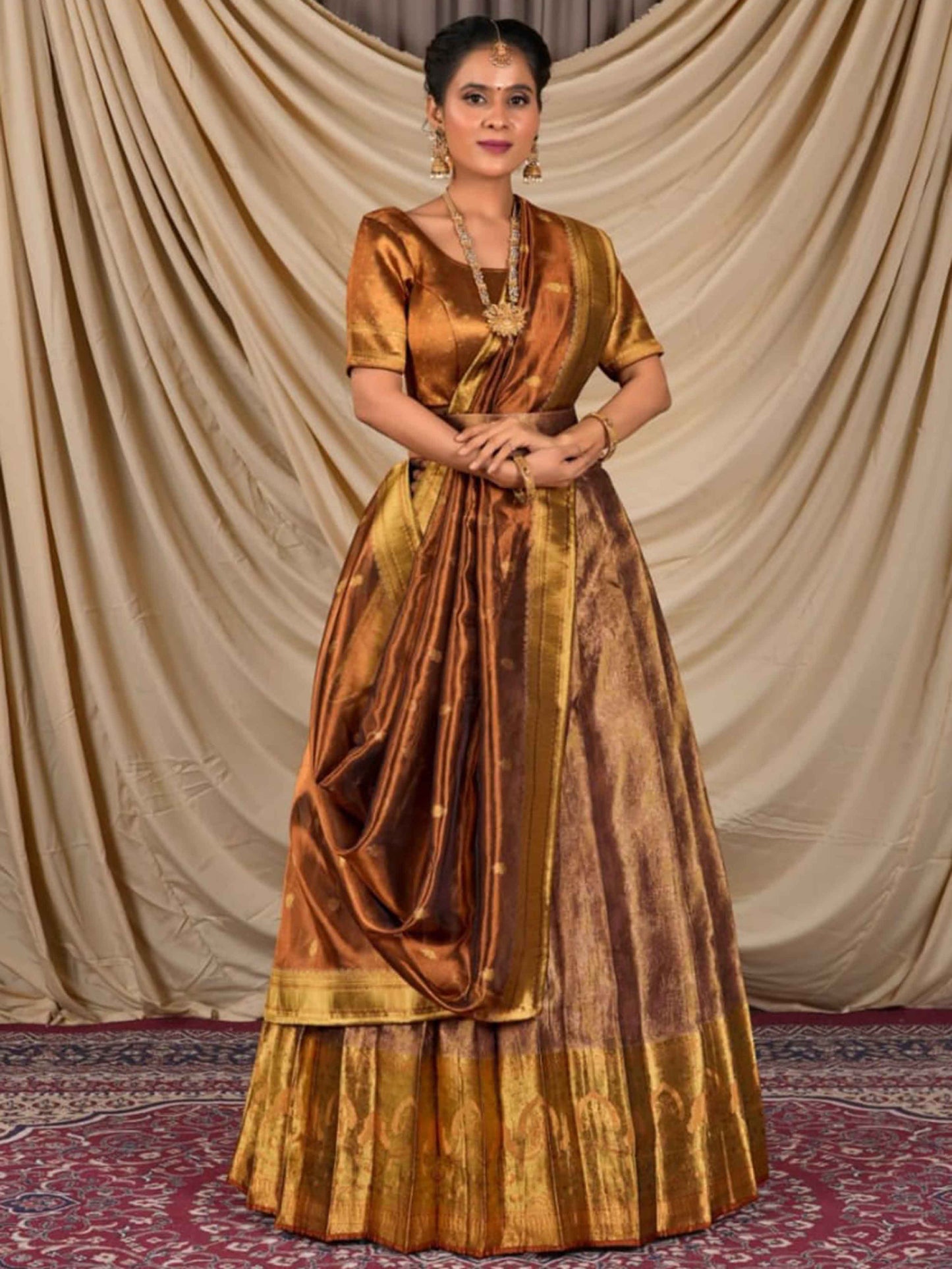 Womens Latest Lehenga Designs Tissue Peach Gold